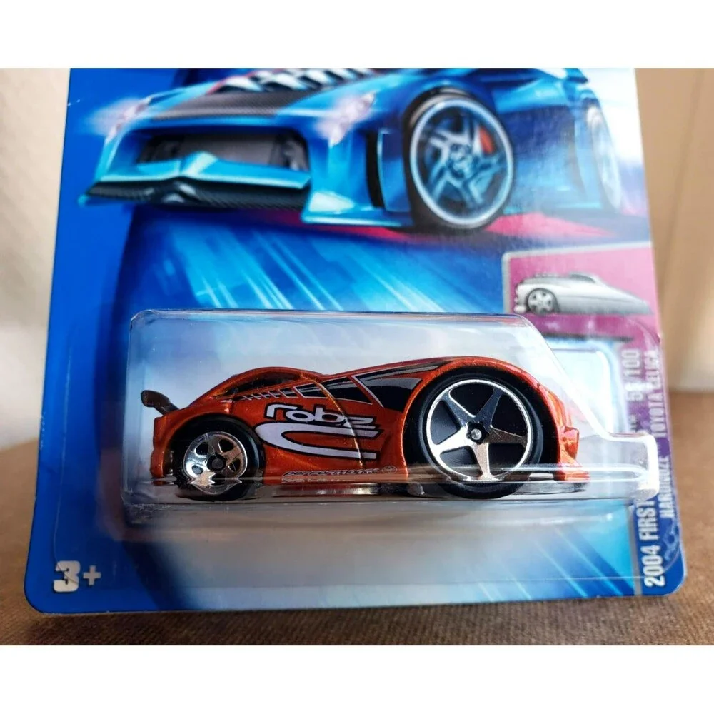 VTG Hot Wheels HARDNOZE TOYOTA CELICA Orange 56/100 2004 First Editions 1:64 5SP